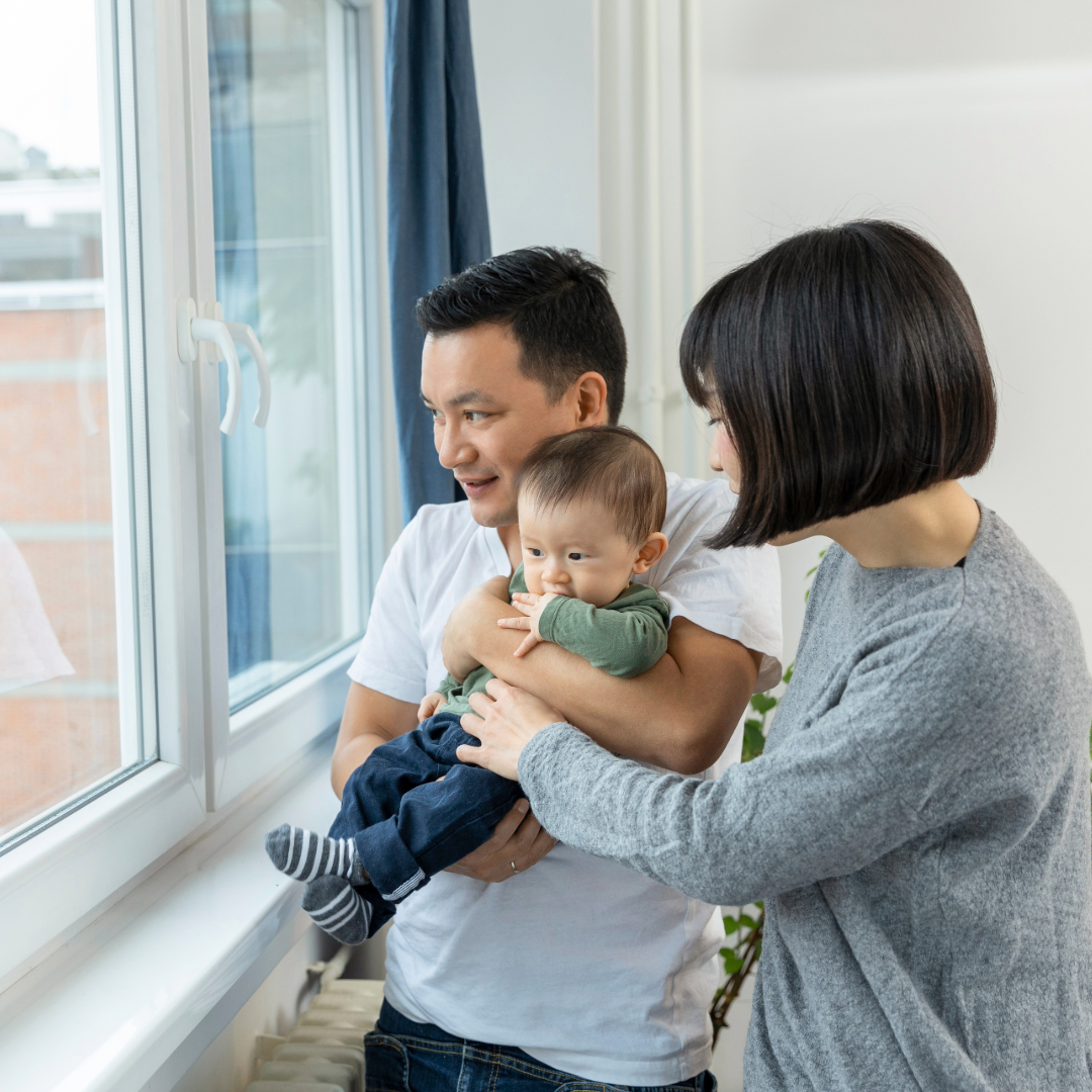 Family in front of Window